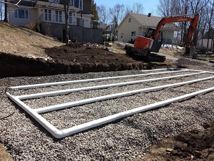 Example of a drainage field being installed